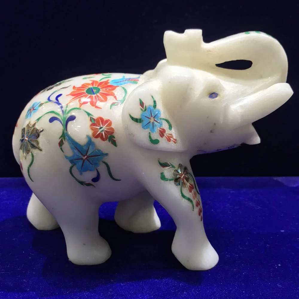 Elegant Marble Inlay Elephant Statue: Craftsmanship and Symbolism