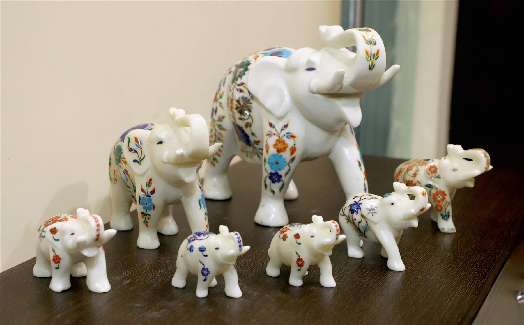 Hand-carved marble inlay elephant sculptures