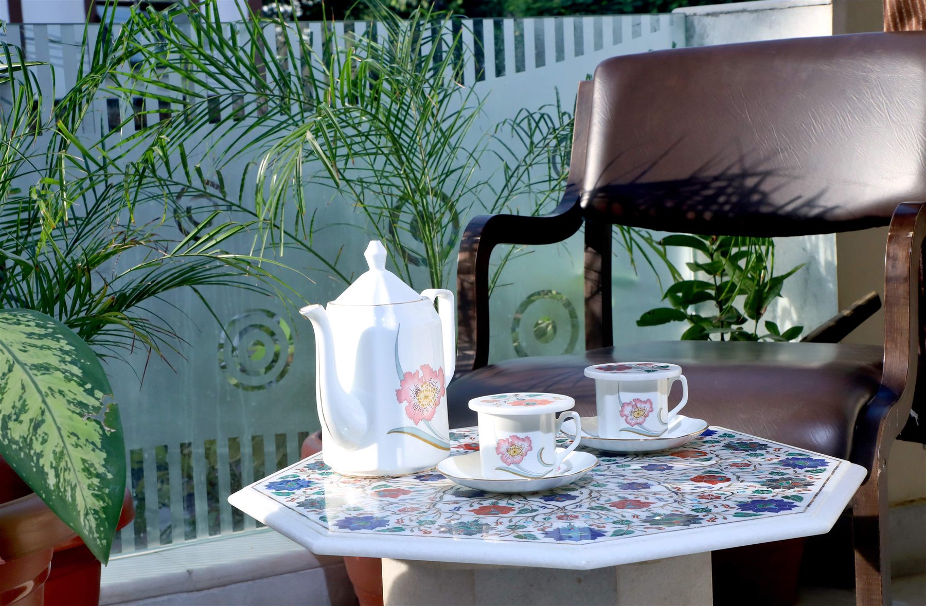 Handmade marble inlay tableware arranged in a home setting